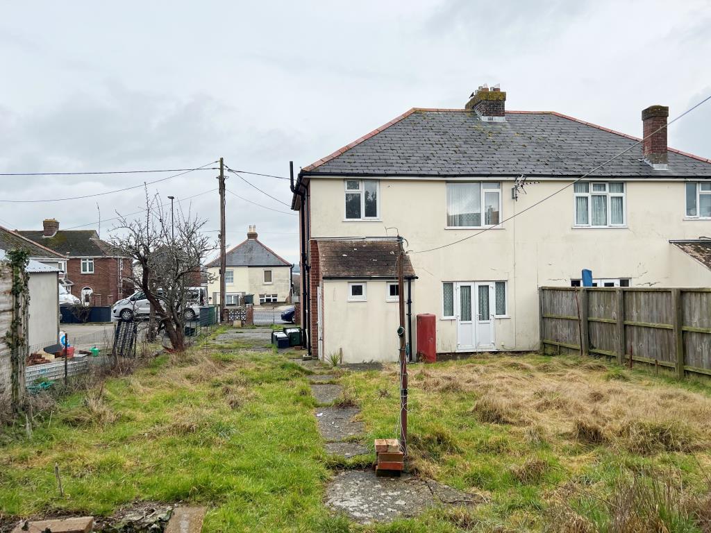 Lot: 127 - SEMI-DETACHED THREE-BEDROOM HOUSE IN NEED OF IMPROVEMENT - Rear View of three-bedroom semi-detached house